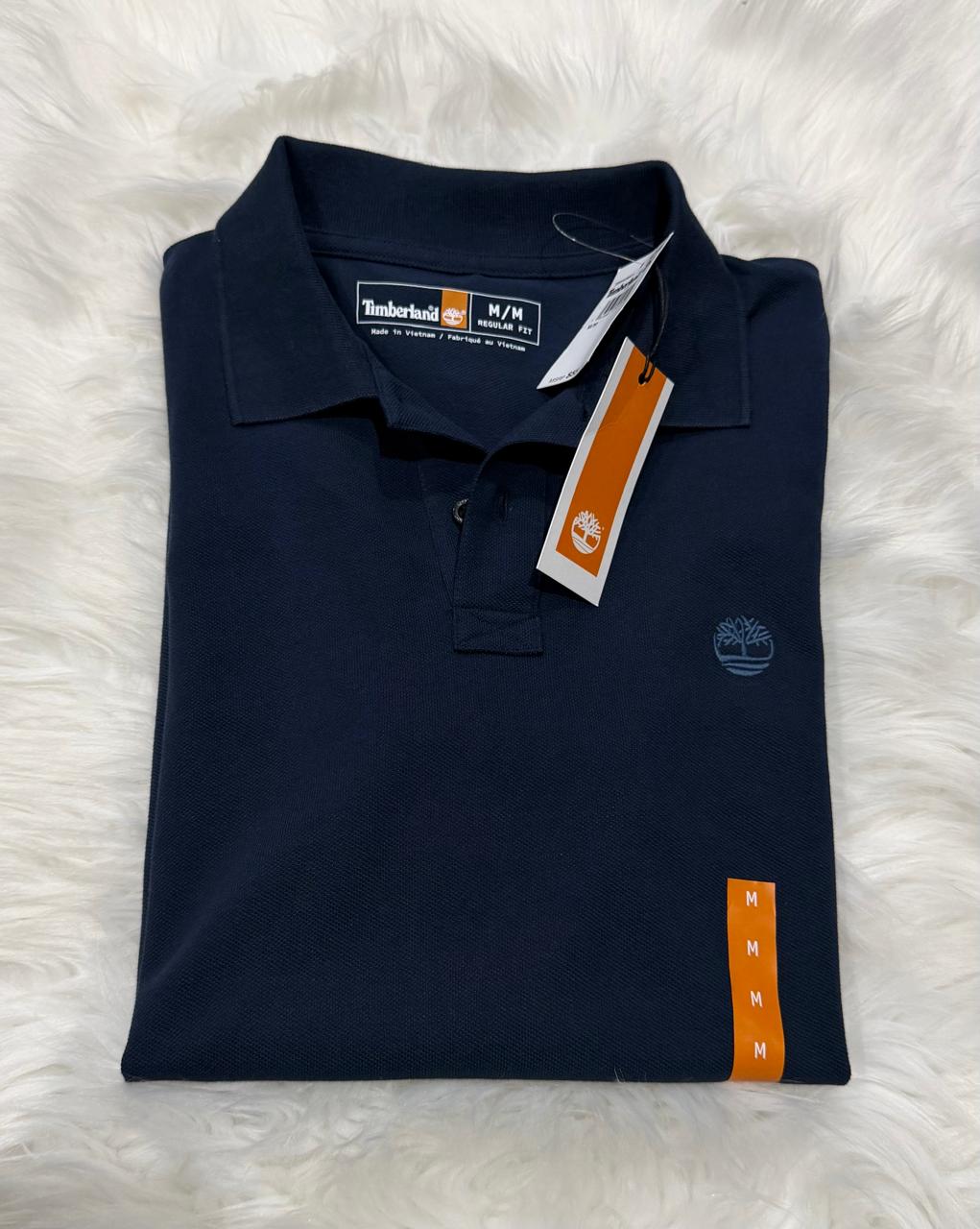 Polo Timberland azul marino clásico para caballero